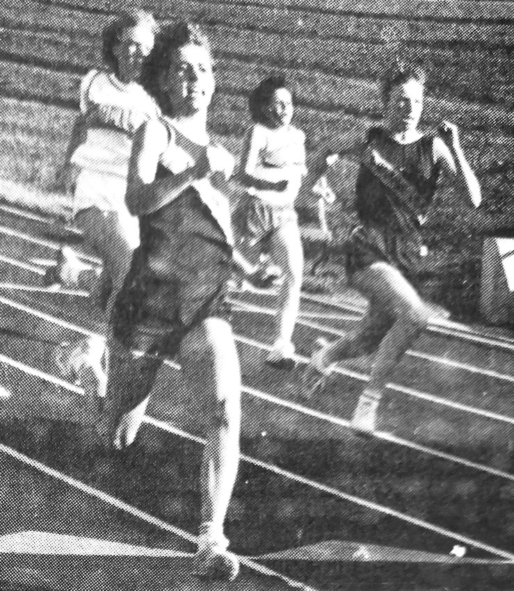 Arlington's Tina Maaske, left, and Wendy Rasmussen, right, placed first and second during a 1986 track and field dual between the Eagles and Blair.