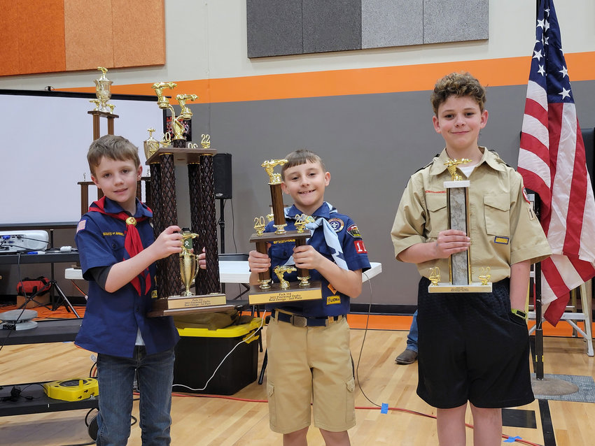 From left, Ethan Taylor placed first, Nolan BenSalah placed second and Maverick Donahoe placed third in the &quot;best design&quot; category during the Fort Calhoun Cub Scout Pack 114's pinewood derby March 20.