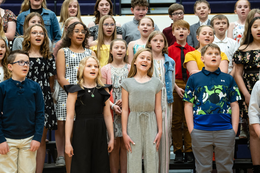 The fifth grade choir sang &ldquo;Singin&rsquo; in the Rain&rdquo; and &ldquo;I Won&rsquo;t Grow Up&rdquo; during the Arbor Park Spring Sing 2022 held in the Blair High School gymnasium.