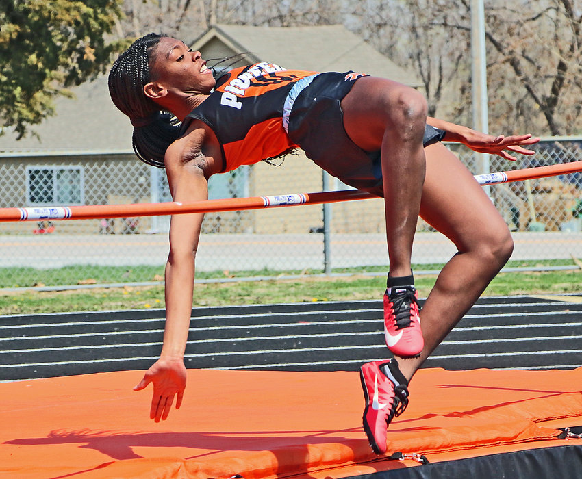 The Pioneers' Dala Drowne clears the high jump bar Tuesday at Fort Calhoun High School.