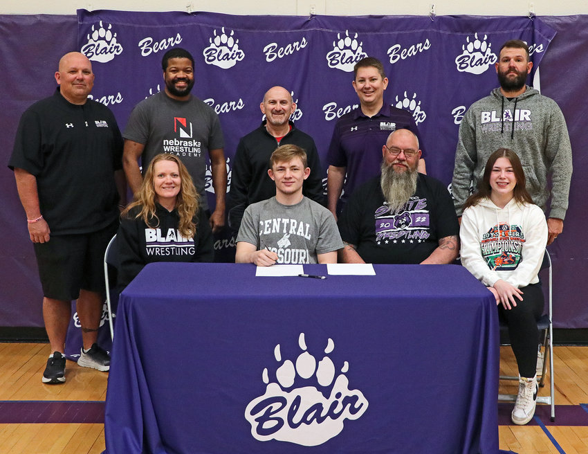 Blair senior Charlie Powers celebrated his signing to the Central Missouri wrestling program Friday with family and his coaches.