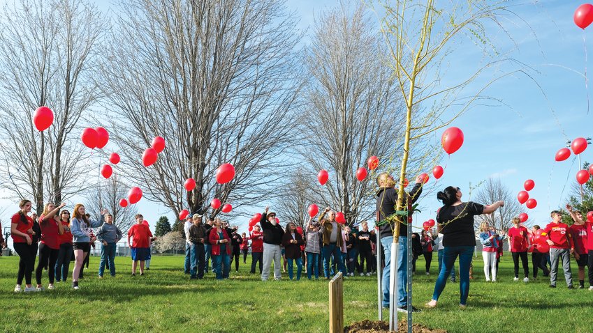 Classmates and friends of Jett Andreasen gathered at Otte Blair Middle School for a tree dedication and balloon release in his honor on May 1. Jett drowned at a private pool following a medical episode in September 2021. He was 13 years old and in 8th grade at the time. Community members began donating to a fund in Jett's memory, which was used to purchase a willow tree.