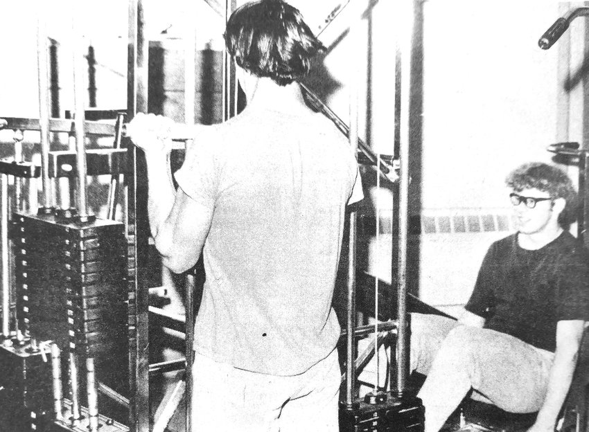 A Citizen photographer captured images of Steve Holtman, Jim Bunderson and Robert Braesch using Arlington High School's new weight machine in 1973, including this one.