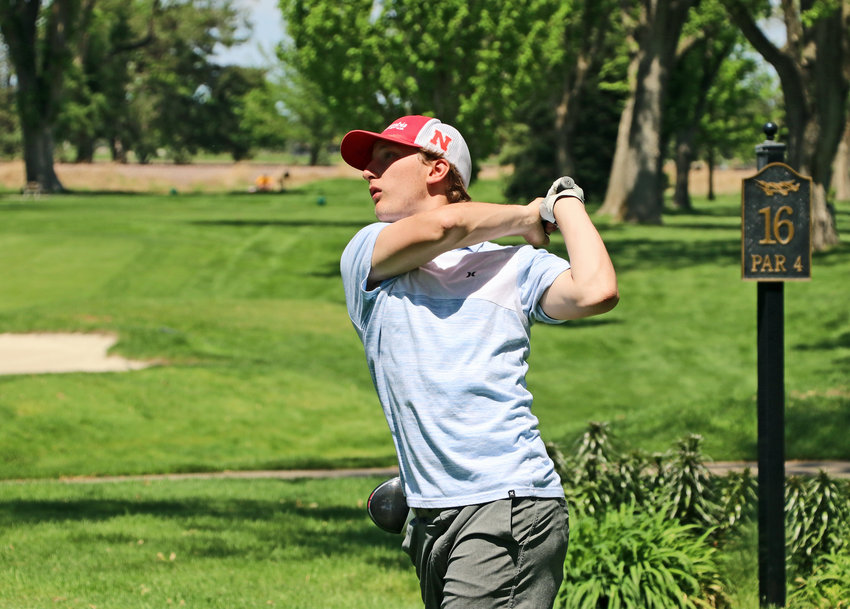 Arlington senior Frankie Rosenbalm hits a tee shot Monday during the Class C District 2 Tournament at Fremont Golf Club.