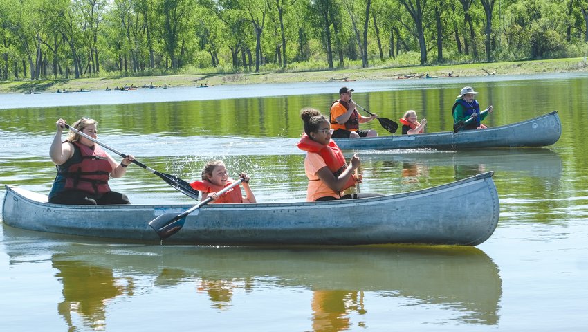 Canoeing was one of the popular activities during the Arbor Park fifth grade outdoor education experiences at DeSoto National Wildlife Refuge. Pictured, from left, are Jennifer Schneider with her daughter, Sophia Schneider and Amiyah Robins. In background are Taylor Jensen, Zayden Gayer and Colton Collins.