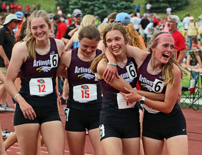 Arlington's Chase Andersen, from left, Hailey O'Daniel, Kailynn Gubbels and Keelianne Green celebrate a school record in the 1,600-meter relay Thursday at Omaha Burke Stadium. The Eagles earned third in the race, finsihing tied for third in Class B overall.