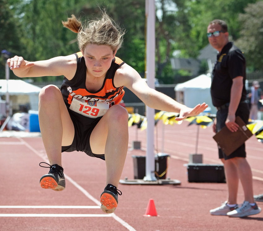 Fort Calhoun freshman Kaylee Taylor competes in the triple jump Thursday during the NSAA State Track and Field Championships at Omaha Burke Stadium.