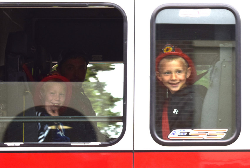 Dylan Krepel and Evan Mackey got to ride in an emergency vehicle to Arlington Elementary School May 20.