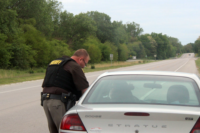 Lt. Butch Groves of the Washington County Sheriff's Office pulls over a vehicle for speeding and improper use of a seatbelt Monday afternoon on U.S. Highway 75 near Fort Calhoun. As part of a nationwide Click it or Ticket program, the sheriff's office is spending two weeks getting deputies on the road to check for seatbelt violations, which are a secondary offense in the state of Nebraska.