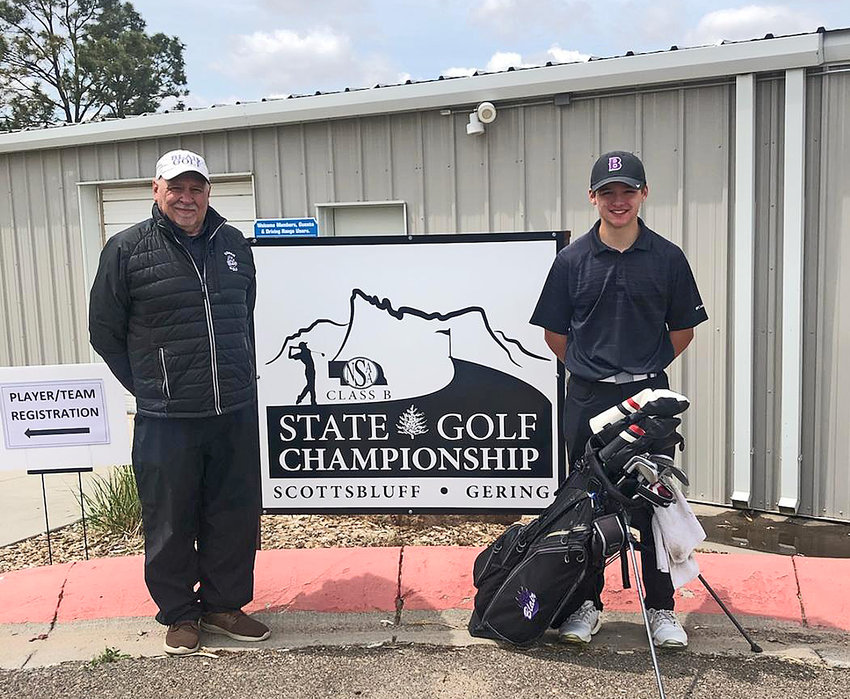 Blair golf coach Ross Udey, left, and junior Easton Chaffee pose for a photo May 24 during the NSAA Class B Boys State Golf Championships in Scottsbluff.
