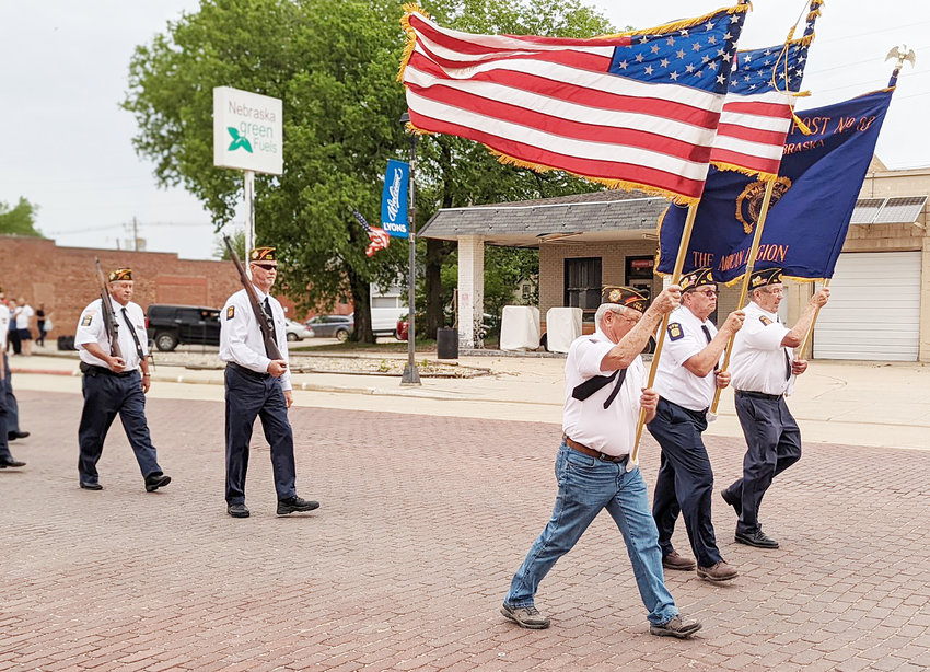 The VFW color guard lead the start of the Memoral Day Ceremony with a parade down Main Street in Lyons.