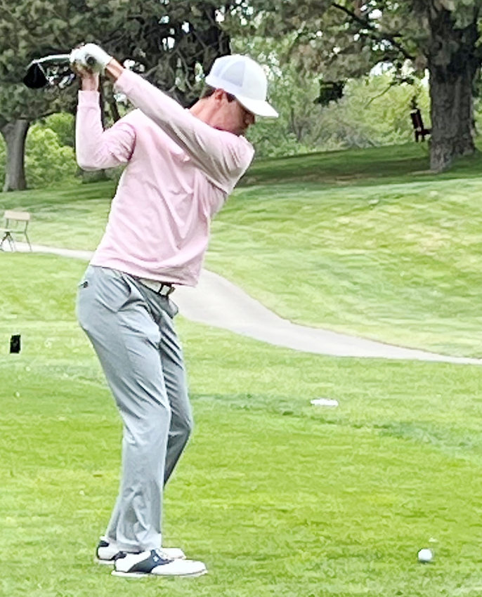 Carson Thomsen tees off during day one at the state golf meet in Columbus.