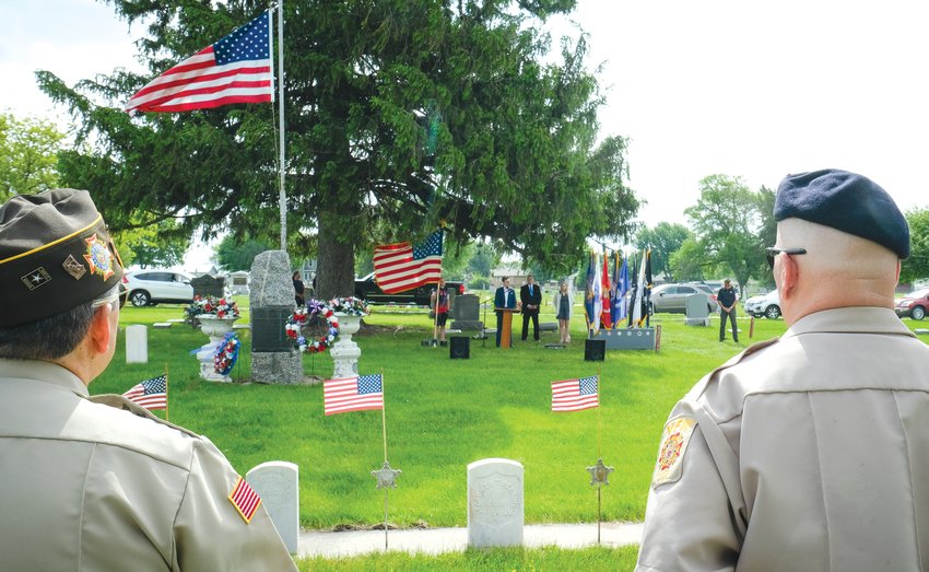 The Blair VFW color guard stands at ease as keynote speaker Ben Larsen delivers the keynote address at Blair's Memorial Day service on May 30.