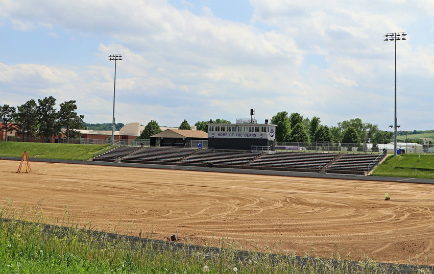 Blair High School's transition from natural grass to field turf is evident Tuesday at Krantz Field. The multi-sport stadium's latest project started in May at the conclusion of the track and field season with hopes of a Aug. 1 completion date. In February, the Blair Community Schools Board of Education approved a bid from Mid America Sports Construction for $958,958.58 to install the synthetic turf playing field.