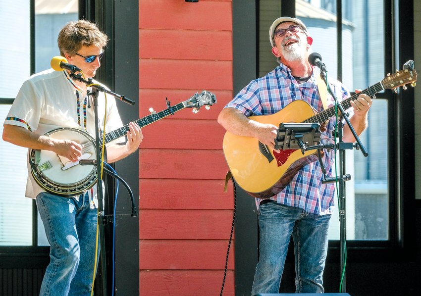 McGovern String Band banjo player Daren Blythe and Kelly McGovern perform at Bluegrass at the Depot Sunday afternoon.