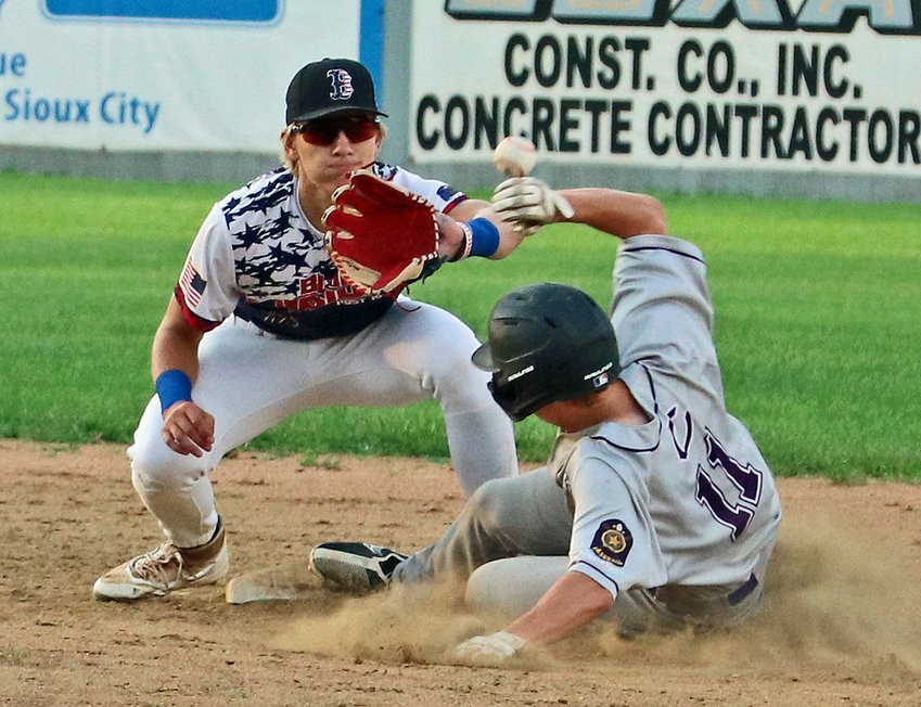 The ball and Omaha Central base runner arrive to second base at the same time where Blair Senior Legion infielder Greyson Kay waits Tuesday at Vets Field.