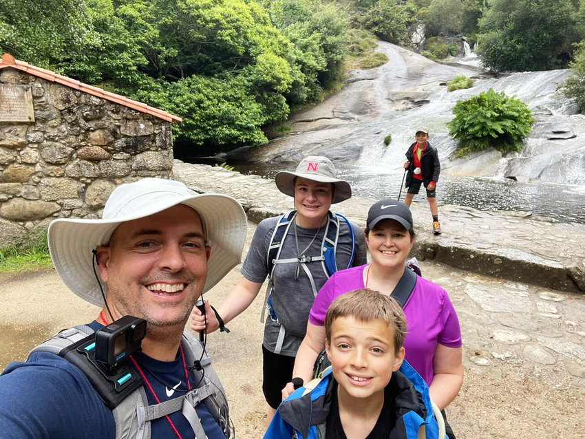 The Hansens, front, from left, Jeremy and Eli, Dathan and Jenny and Isaac visit the falls on their journey on the El Camino.