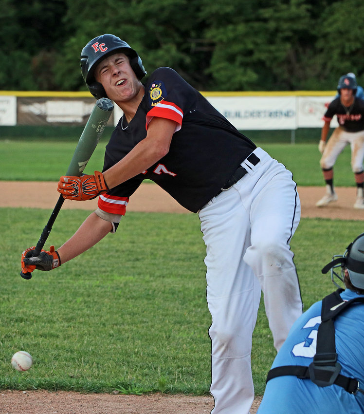Post 348 Senior Legion batter Kenny Wellwood is hit by a Plattsmouth pitch Thursday in Fort Calhoun.