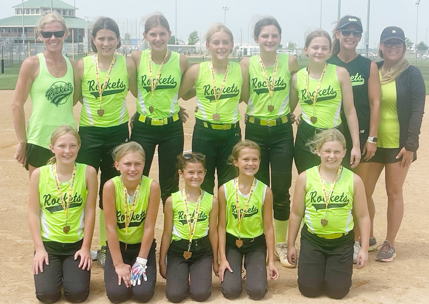 Fourth Place Team at State Class D Softball the Oakland -Craig Rockets 12 and under team. From front left: Louden Pelan, Raygen Olson, Celeste Rost, Sabrina Rost and Avery Christensen. Back row: Coach Annie Christensen, Brinley Burton, Lily Petersen, Marysa Moseman, Hilary Ray, Cadence Johansen, Coach Nikki Ray and Coach Casey Moseman.
