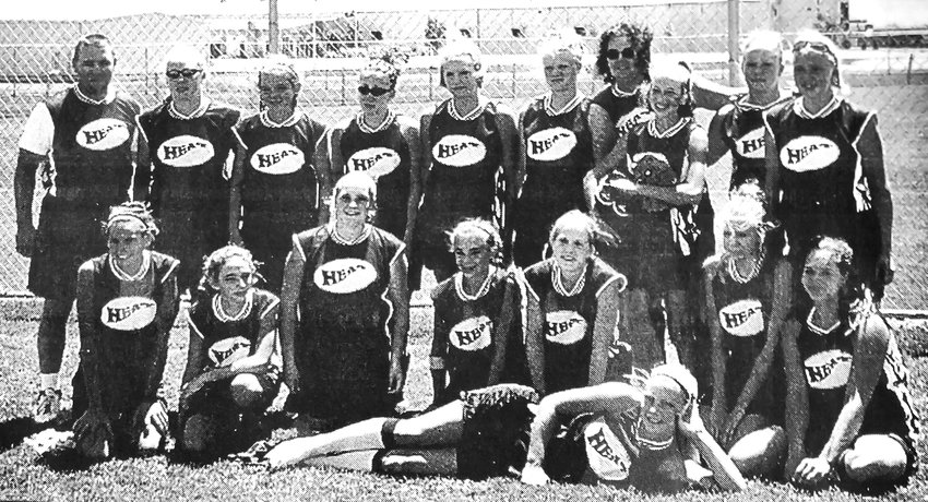 The 2002 Arlington Heat softball team claimed fifth at the state tournament. Front row, from left: Erica Leaver, Bree Opfer, Chelsea Wilcox, Breanna Wearden, Jessica Schmidt, Tonya Reker, Kristin Schwwarzlander and Collette Wagner. Back row: Coach Steve Boulton, Claire Rogers, Amber Boulton, Kelsey Hallstrom, Jessica Wolf, Betsey Sibbersen, coach Debbie Wagner, Mady Berg, Sienna Waegli and Kelsey Thompson.