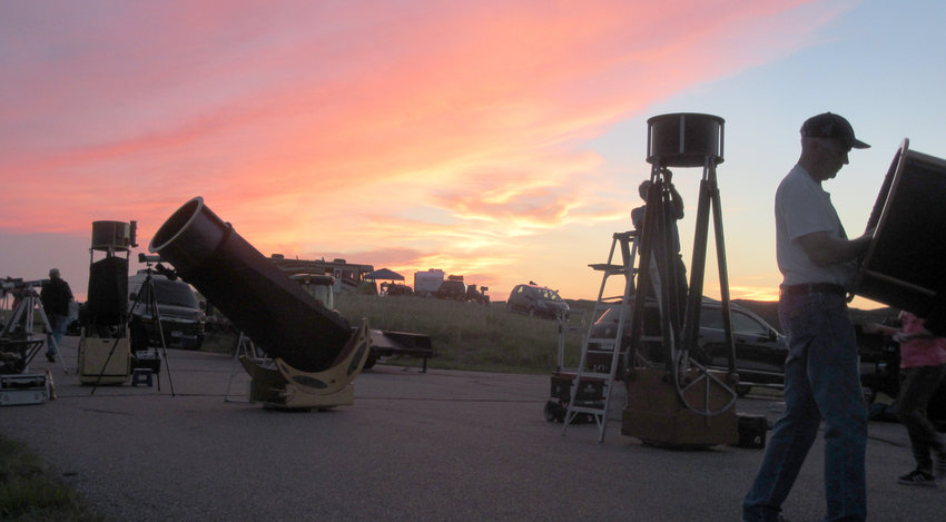 Sun sets on the Nebraska Star Party south of Valentine where hundreds of amateur astronomers ready their telescopes for all night viewing of the universe from under a beautifully dark sky.