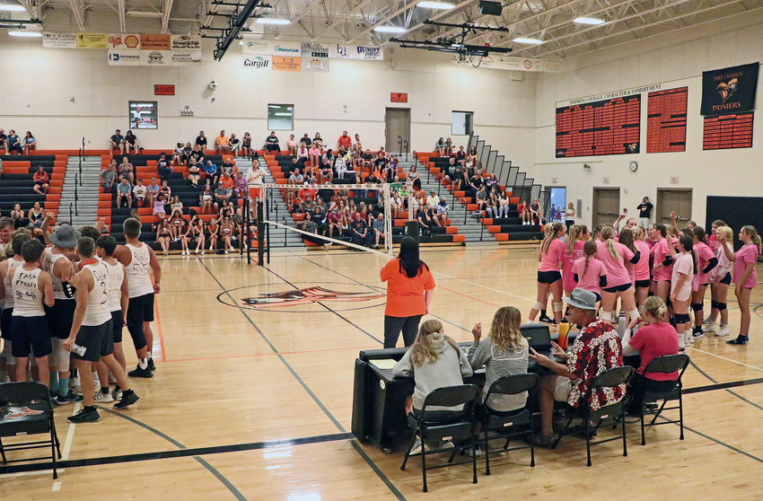 The Pioneers volleyball and football teams met on the court Friday for a volleyball scrimmage at Fort Calhoun High School.