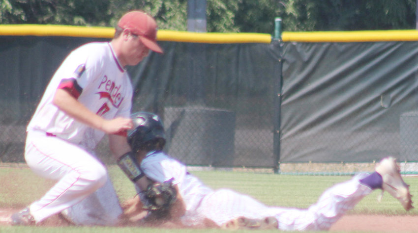 Shortstop Zach Hegge catches the throw from the catcher and puts on the tag on the runner stealing second base.