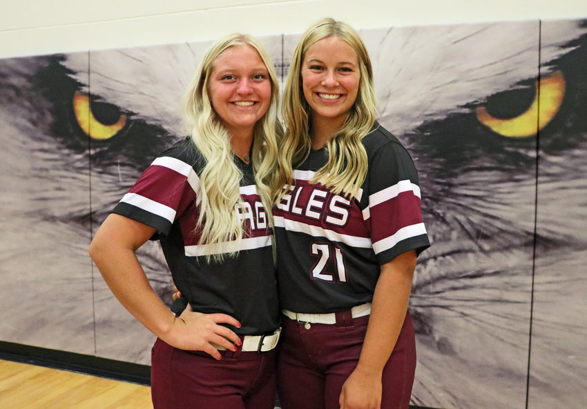 Seniors Hannah Stahlecker, left, and Cadie Robison are among the Arlington Eagles' top softball returners this fall.