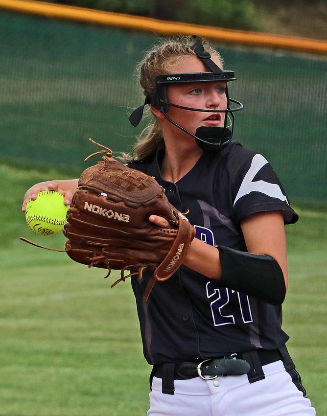 Blair senior Ally Lynch throws the ball to first base for an out Friday in Bellevue.