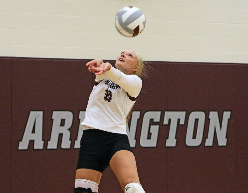 Eagles junior Austyn Flesner makes a play on the ball during warmups for Arlington's Aug. 19 intrasquad scrimmage.