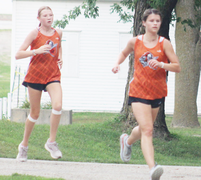 First year senior runner, Gabi Linder was second and freshman Carolyn Magnusson was third in the scrimmage run..................