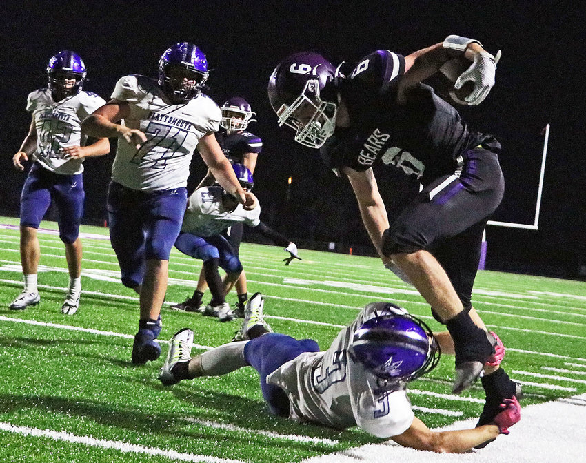 Blair sophomore Brock Templar, right, finishes off a second-half run against Plattsmouth on Friday at Krantz Field. The Bears beat the Blue Devils 40-21.