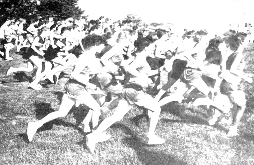Cross-country runners take off at the start of the 1990 Blair Invitational.