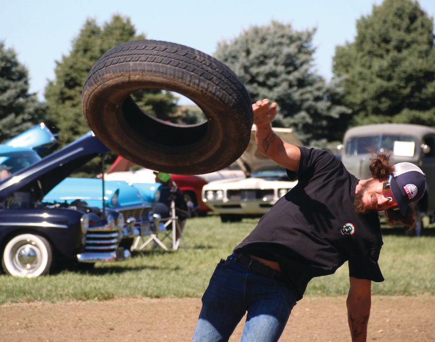 Sam Bloomfield, Blair, lets 'er rip at the Tire Toss at Herman Days on Sept. 11.