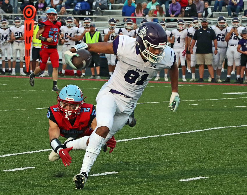 Blair receiver J'Shawn Unger, right, evades the Rams' Hudson Holloway on Friday at Ralston High School.