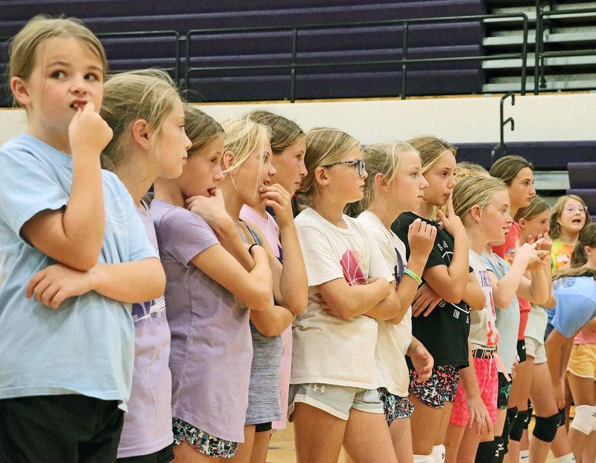 Youth volleyball players line-up before an hour-long session practicing with the Blair Bears on Monday at BHS.