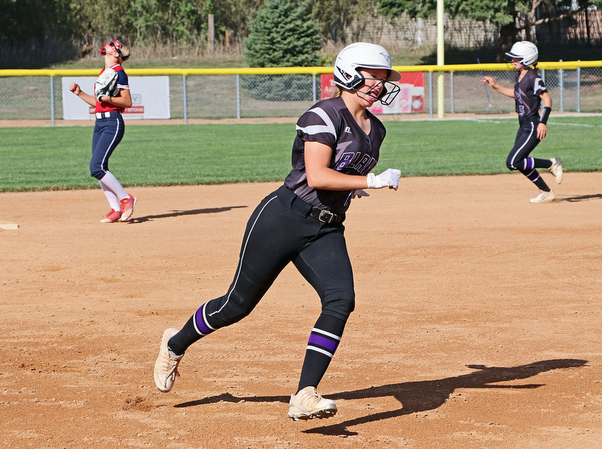 Blair's Sophia Wrich, middle, rounds the bases against Platteview on Monday at the Youth Sports Complex.