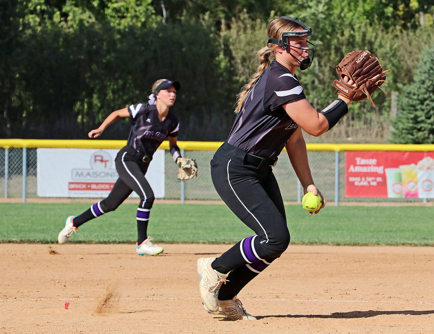 Blair left-hander Brooke Janning, right, pitches as Leah Chance backs her up Monday at the Youth Sports Complex.