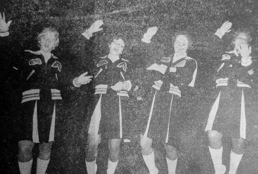 Arlington High School cheerleaders Karen Toebben, from left, Angie Stork, Cheryl Gottsch and Mary Ann Hilgenkamp rooted for the 1962 Eagles football team.