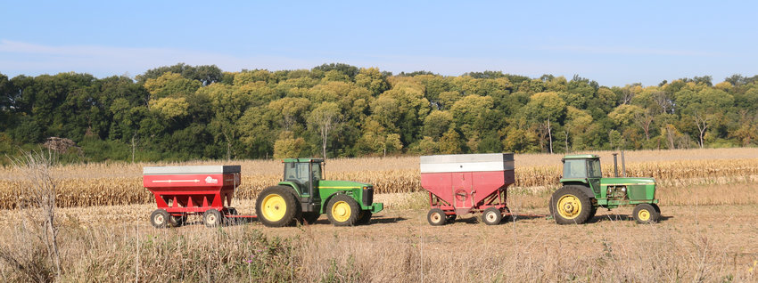 Grain carts stay ready for the next load of grain in a rural Washington County field.