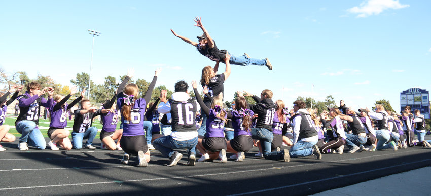 Joey Lamontia and Seagan Packett-Trisdale recreate the famous &quot;Time of My Life&quot; scene from Dirty Dancing during a dance routine with the football and dance teams at the Blair High School homecoming pep rally on Oct. 7.