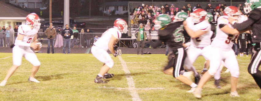Treyton Frahm gets pass protection from Daven Whitley, Landon  Redding, and Talon Mock.