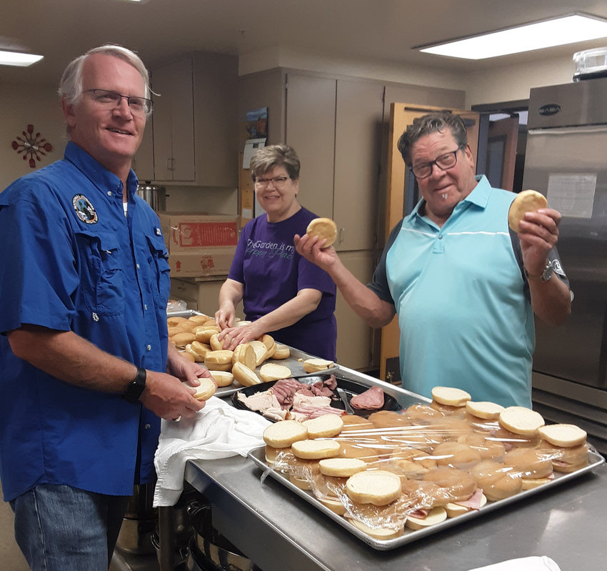 Blair Rotary Club members prepare sandwiches for the First Lutheran Church Midweek Meal.