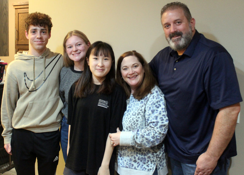 The Irvine family of Fort Calhoun is hosting two foreign exchange students through the school year. Pictured from left, Jose Luis Soriano, from Spain; Bella Irvine; Minnie Ma, from Taiwan; Nicole Irvine and Chance Irvine.