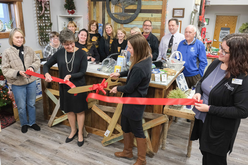 Roots to Wings celebrated its expansion at 220 3rd St. with a ribbon cutting and open house last week. Pictured are, from left, Melanie Kaeding, Sheila Monke, Trisha Kyllo and Caitlyn Marcano.