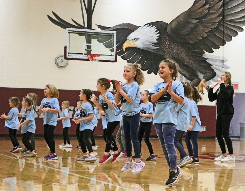 Youth dancers performed Saturday during halftime at Arlington High School.