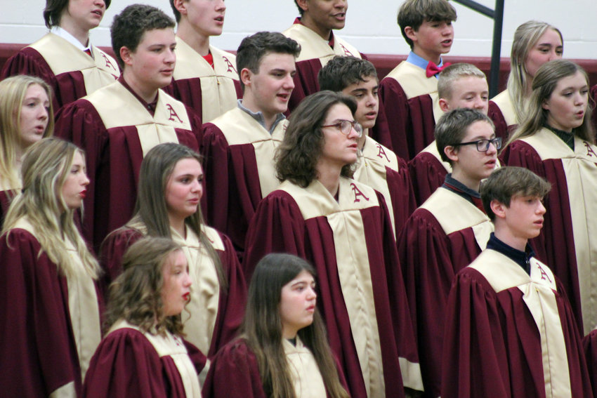 The Arlington High School choir began their section with Paul McCartney's &quot;Wonderful Christmastime&quot; Tuesday at the winter concert.