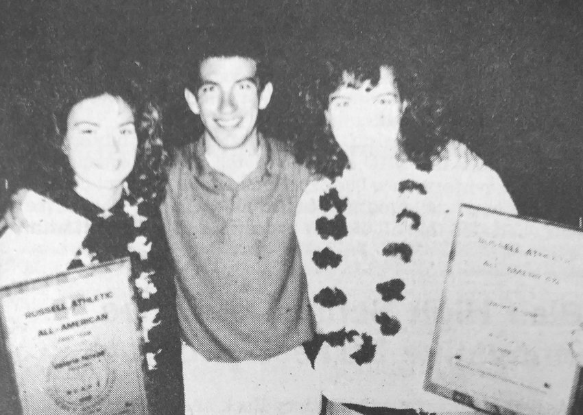 Steve Lemon, middle, poses for a photo with Nebraska All-American volleyball players Val Novak, left, and Janet Kruse during the 1989 NCAA Championships in Hawaii. Lemon and Kruse are both from Blair.