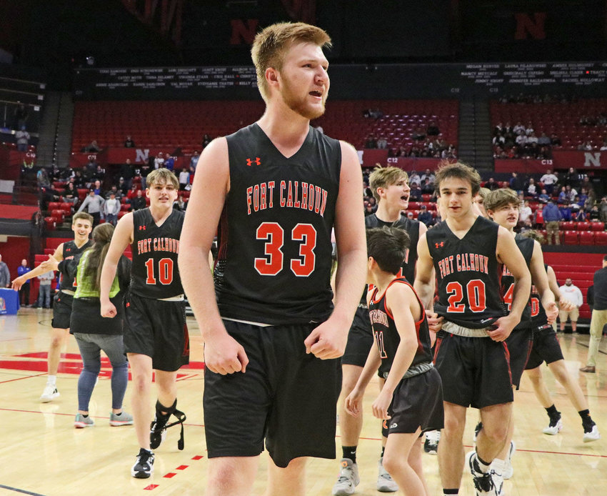 Carsen Schwarz and the Fort Calhoun Pioneers celebrate their Class C1 state tournament win last March at the Bob Devaney Sports Center in Lincoln.