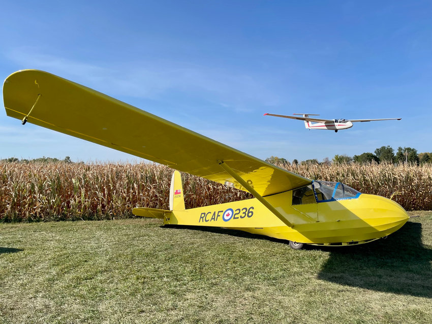 John Haarala lands the Omaha Soaring Club&rsquo;s L-23 as the Schweizer 2-22 awaits its turn at the Blair Executive Airport's grass runway.